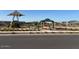 Community playground with sunshades, slides, and climbing structures offering residents outdoor enjoyment at 4035 S 176Th Dr, Goodyear, AZ 85338