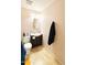 This cozy bathroom features a vanity sink, toilet and towel rack at 4810 N 69Th Dr Dr, Phoenix, AZ 85033