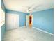 This bright bedroom has tiled floors, closet space and plenty of natural light at 4810 N 69Th Dr Dr, Phoenix, AZ 85033