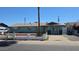 Inviting single-story home featuring a quaint yard, driveway, and well-maintained facade at 4810 N 69Th Dr Dr, Phoenix, AZ 85033