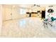 Cozy kitchen and living area with updated floors and lots of natural light at 4810 N 69Th Dr Dr, Phoenix, AZ 85033