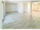 Spacious living room with sliding glass doors and access to other rooms at 4810 N 69Th Dr Dr, Phoenix, AZ 85033