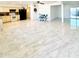 Bright and airy living room featuring marble flooring and an open floor plan at 4810 N 69Th Dr Dr, Phoenix, AZ 85033