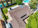 Aerial view showcasing the roof, pool, and surrounding landscape of a well-maintained property at 4837 E Pershing Ave, Scottsdale, AZ 85254