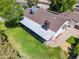 Aerial view of the property featuring a well-maintained lawn, patio and unique chimney at 4837 E Pershing Ave, Scottsdale, AZ 85254