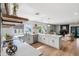 Bright, modern kitchen with white cabinets, stainless appliances, island, and open layout at 4837 E Pershing Ave, Scottsdale, AZ 85254