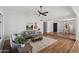 Inviting living room with vaulted ceilings, wood floors, and comfortable seating area at 4837 E Pershing Ave, Scottsdale, AZ 85254