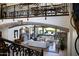 Open-concept living room with stone archways and views of the backyard pool at 5610 E Sanna St, Paradise Valley, AZ 85253