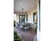Charming patio space with ample seating, brick flooring, and great lighting at 5610 E Sanna St, Paradise Valley, AZ 85253