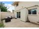 Spacious backyard with a patio area, storage shed, and privacy fence at 6005 N Granite Reef Rd, Scottsdale, AZ 85250
