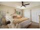 Inviting bedroom with a plush bed, soft textures, and plenty of natural light at 6005 N Granite Reef Rd, Scottsdale, AZ 85250