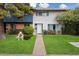 Charming two-story home with well-maintained lawn and inviting entrance at 6005 N Granite Reef Rd, Scottsdale, AZ 85250