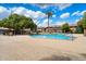 Community pool with clear blue water and plenty of lounge space at 6005 N Granite Reef Rd, Scottsdale, AZ 85250