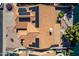 High angle view of rooftop solar panels and swimming pool on lakeside home at 608 E Stonebridge Dr, Gilbert, AZ 85234