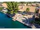 A lovely patio area sits next to the water providing a place to relax and enjoy nature at 608 E Stonebridge Dr, Gilbert, AZ 85234