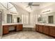 Spacious bathroom featuring double sinks, soaking tub, and walk-in shower at 608 E Stonebridge Dr, Gilbert, AZ 85234