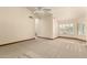 Bright main bedroom with neutral carpet and tranquil views of the lake at 608 E Stonebridge Dr, Gilbert, AZ 85234