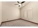 Neutral bedroom showcasing ceiling fan, single window, and plenty of space for furniture at 608 E Stonebridge Dr, Gilbert, AZ 85234