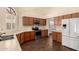 Bright kitchen features wood cabinets, white countertops, stainless appliances, and tile flooring at 608 E Stonebridge Dr, Gilbert, AZ 85234