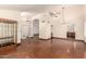 Spacious living room with multiple archways and lighting fixtures at 608 E Stonebridge Dr, Gilbert, AZ 85234