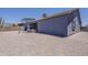 Spacious backyard with desert landscaping, patio area, and hot tub, ideal for outdoor living at 6154 S Borego Rd, Gold Canyon, AZ 85118