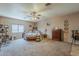 Spacious bedroom with neutral walls, ceiling fan, and comfortable carpeting at 6154 S Borego Rd, Gold Canyon, AZ 85118