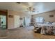 Large bedroom with neutral walls, ceiling fan, carpeting, and plenty of room for furniture at 6154 S Borego Rd, Gold Canyon, AZ 85118