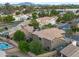 Aerial view of a residential neighborhood featuring well-maintained homes and tree-lined streets at 630 W Saragosa St, Chandler, AZ 85225
