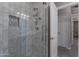 Bathroom shower with elegant tile work and a modern showerhead and a glass door, looks clean and inviting at 630 W Saragosa St, Chandler, AZ 85225