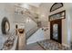 Elegant foyer featuring a staircase, decorative tile flooring, and lots of natural light at 630 W Saragosa St, Chandler, AZ 85225