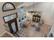 Bright living room with soaring ceilings, hardwood floors, and lots of natural light at 630 W Saragosa St, Chandler, AZ 85225