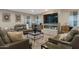 Comfortable living room with modern fireplace, plush seating, and contemporary design at 630 W Saragosa St, Chandler, AZ 85225
