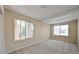 Bedroom with neutral tones, carpet flooring and lots of natural light at 6923 W Laredo St, Chandler, AZ 85226