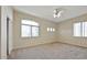 Bedroom with carpet flooring and a ceiling fan at 6923 W Laredo St, Chandler, AZ 85226