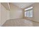 Bonus room with tile flooring, large windows for natural lighting and a ceiling fan at 6923 W Laredo St, Chandler, AZ 85226