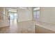 Bright and spacious living room with tile flooring, stairway, natural light and neutral walls at 6923 W Laredo St, Chandler, AZ 85226