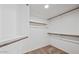 Walk-in closet with wood shelving at 6923 W Laredo St, Chandler, AZ 85226