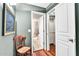 Hallway with a view to the bathroom and closet, offering an easy transition between spaces for added convenience at 8532 E San Bruno Dr, Scottsdale, AZ 85258