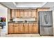 The kitchen features stainless steel appliances, a granite countertop, custom cabinets and recessed lighting at 8532 E San Bruno Dr, Scottsdale, AZ 85258