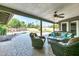 Relaxing outdoor patio with comfortable furniture and view of the sparkling pool, perfect for entertaining and lounging at 8532 E San Bruno Dr, Scottsdale, AZ 85258