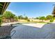 Beautiful pool and backyard featuring a pergola, landscaping, and ample space for outdoor activities at 8532 E San Bruno Dr, Scottsdale, AZ 85258