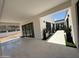 Spacious outdoor patio area with modern pavers, landscaping and mountain views at 9027 S 19Th St, Phoenix, AZ 85042