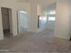 Neutral bedroom showcasing ample natural light, plush carpeting, and a relaxing, airy atmosphere at 9233 E Neville Ave # 1011, Mesa, AZ 85209