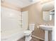 Bathroom featuring a shower and tub combo, a toilet, and a sink with storage at 9233 E Neville Ave # 1127, Mesa, AZ 85209
