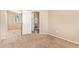 Bedroom has tan walls, carpet, a mirrored closet, and a door leading to another room at 9233 E Neville Ave # 1127, Mesa, AZ 85209