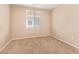 Bedroom features neutral walls and a window with a view at 9233 E Neville Ave # 1127, Mesa, AZ 85209