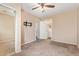 Bedroom includes a ceiling fan, closet, and an adjoining bathroom at 9233 E Neville Ave # 1127, Mesa, AZ 85209