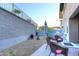 Backyard seating area with a grill and well-maintained landscaping, perfect for relaxing and outdoor dining at 1 Easy St # 17, Carefree, AZ 85377