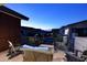 Cozy balcony seating with a lovely view of the complex at dusk, perfect for enjoying evening sunsets at 1 Easy St # 17, Carefree, AZ 85377