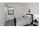 Clean, carpeted bedroom featuring a full-sized bed and minimalist decor, offering a serene and simple aesthetic at 1 Easy St # 17, Carefree, AZ 85377